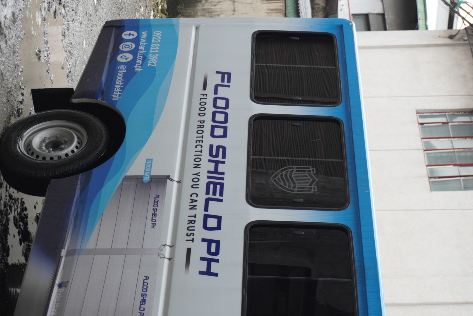 Technician assessing a building entrance